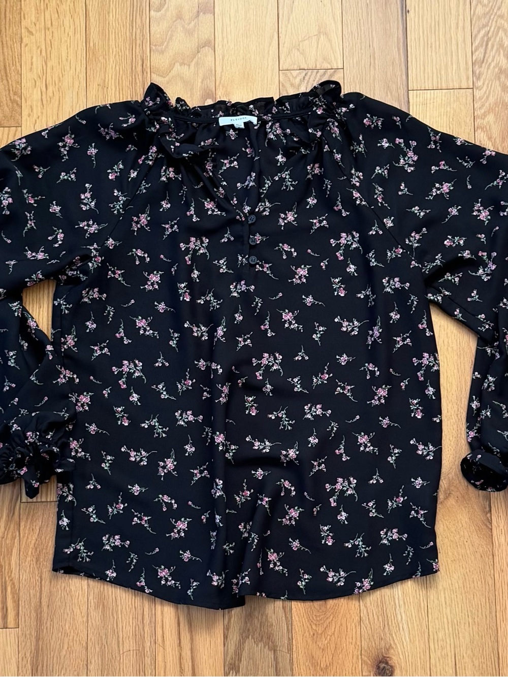 Pleione Black Floral Ruffle-Trim Blouse